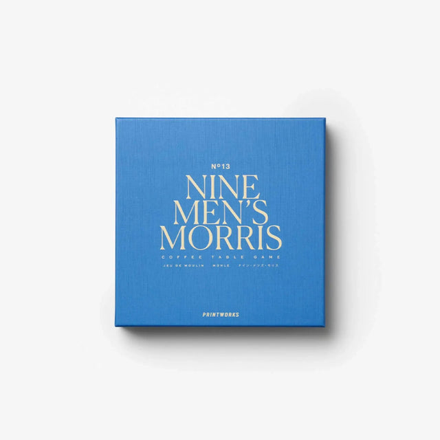 Mühle Spiel von Printworks – geschlossene blaue Verpackung mit goldener Typografie