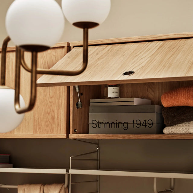 Schrank mit Klapptür 58x30cm Eiche – String Furniture